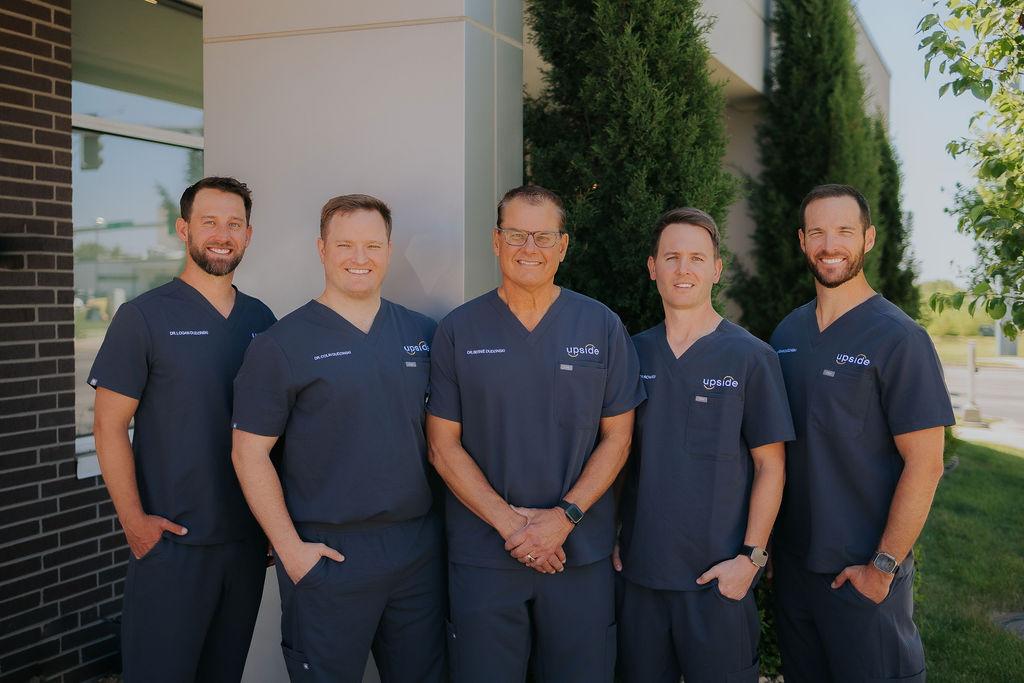 Group of Upside doctors smiling